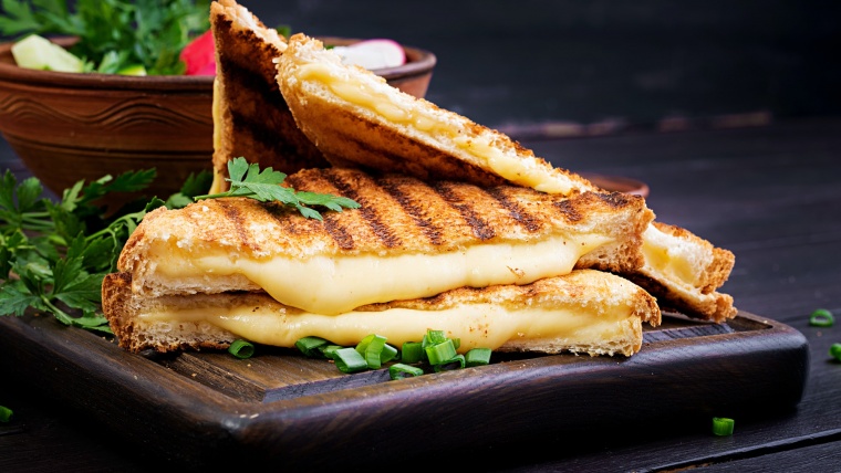 American hot cheese sandwich. Homemade grilled cheese sandwich for breakfast.