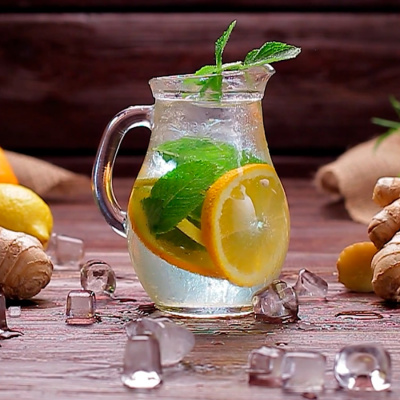 clear glass pitcher with lemon juice
